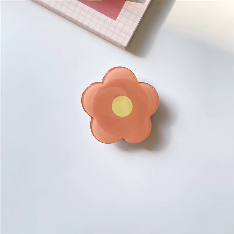 Orangefarbene Blumen -Acryl -Pop -Sockel