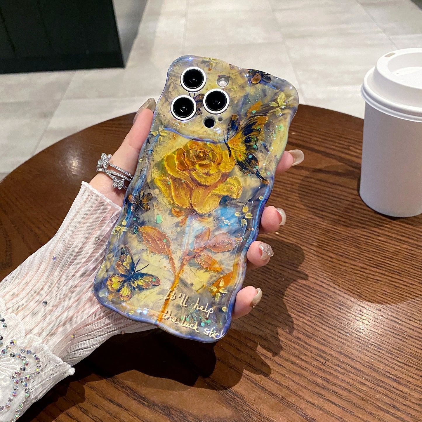 Golden Rose & Butterflies iPhone Case in hand