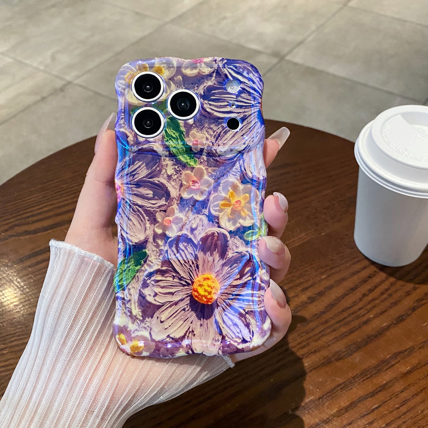 Purple Daisy Meadow iPhone Case in hand