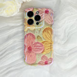 iPhone-Hülle mit rosa und gelben Gerbera-Gänseblümchen
