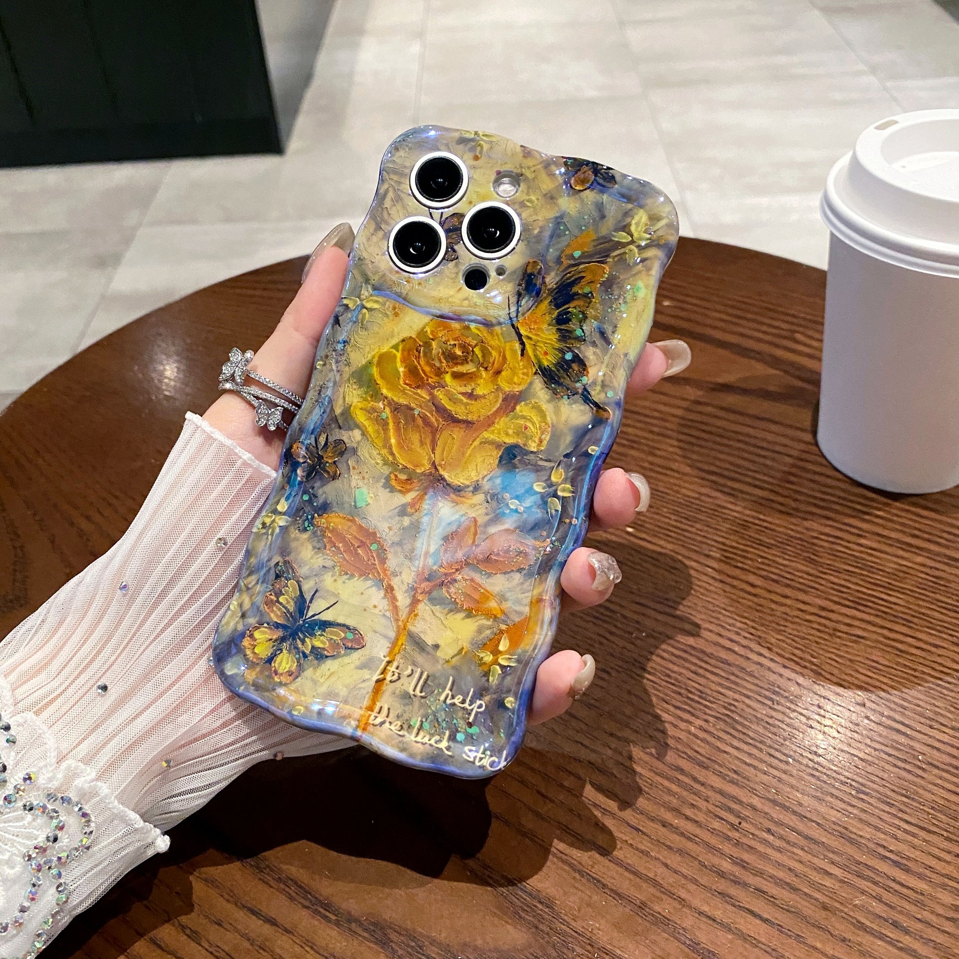 Golden Rose & Butterflies iPhone Case in hand