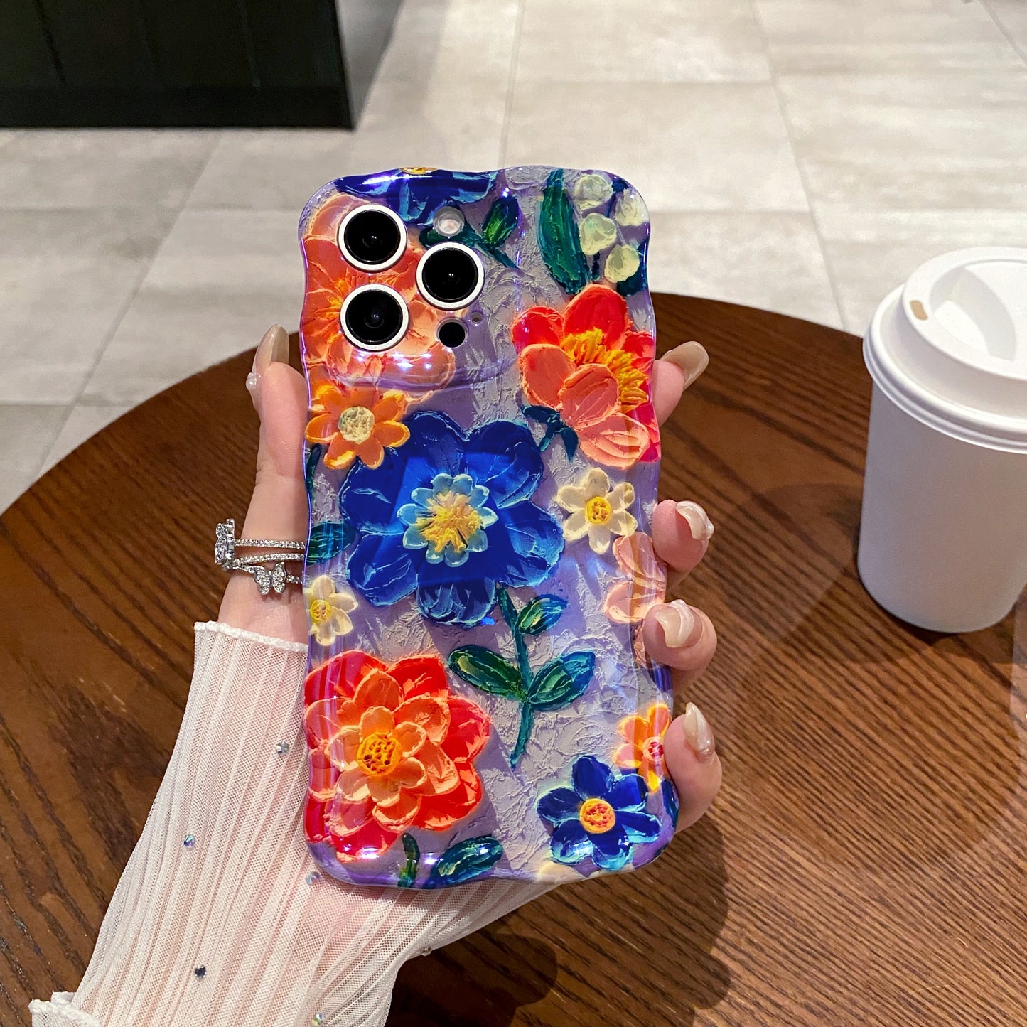 Blue & Orange Flower Garden iPhone Case with vivid blooms