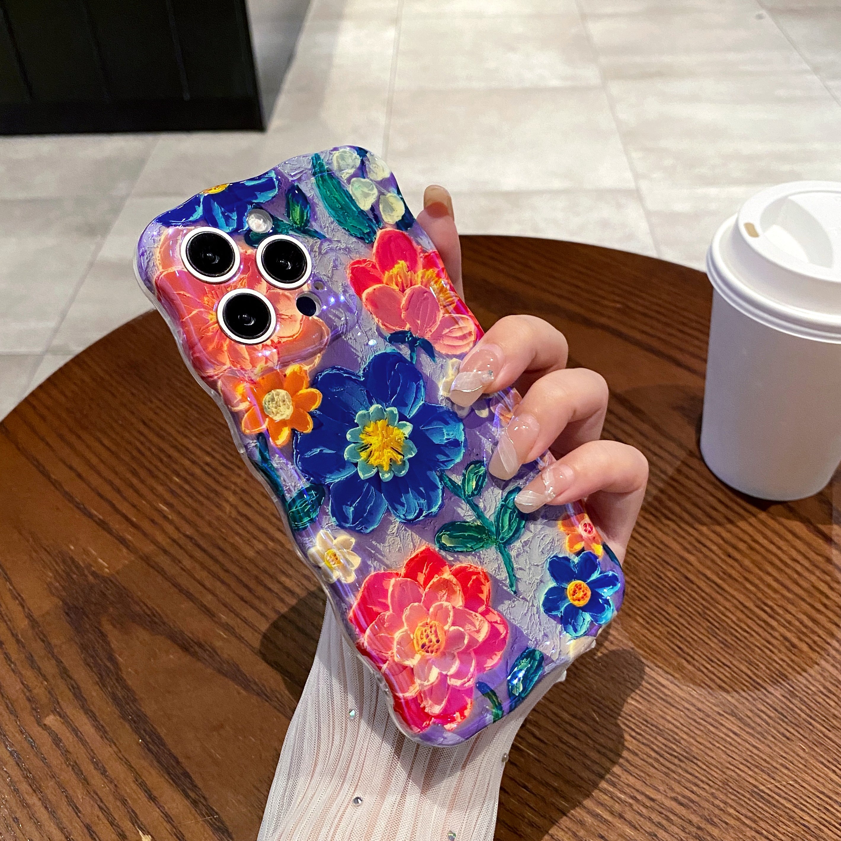 Blue & Orange Flower Garden iPhone Case with vivid blooms