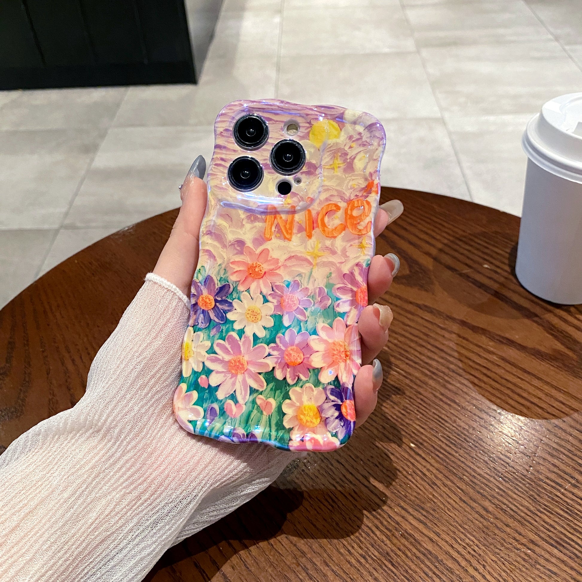 Nice Daisy Meadow iPhone Case in hand