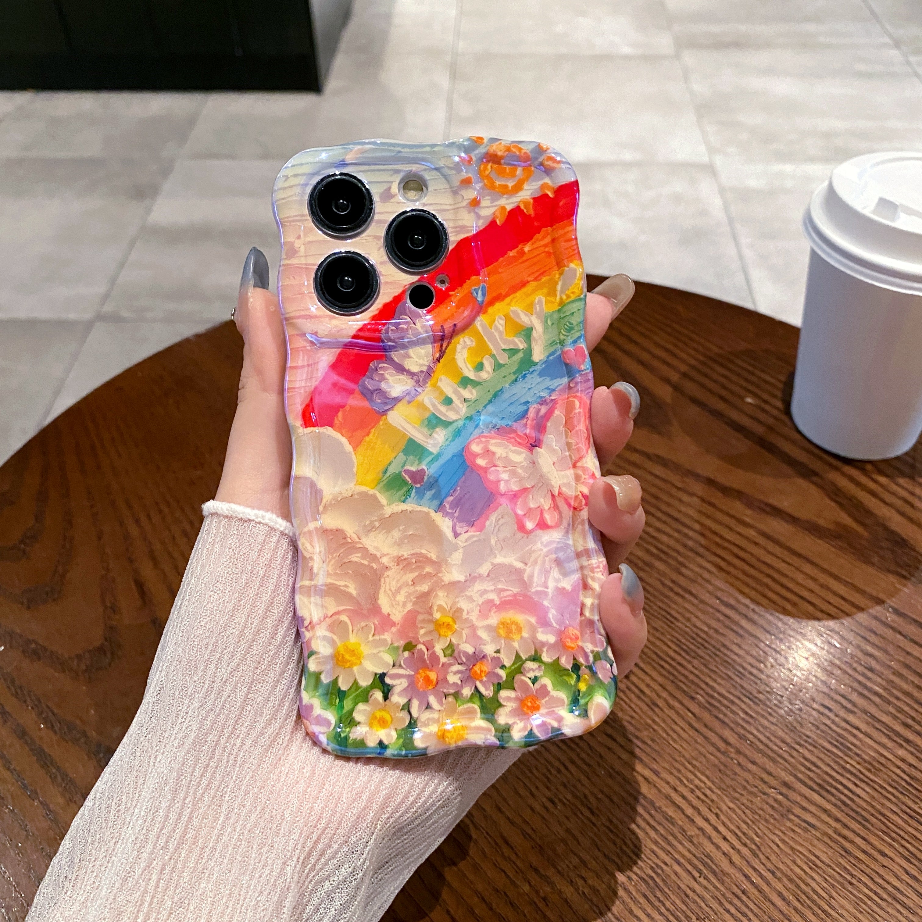 Lucky Rainbow iPhone Case in hand