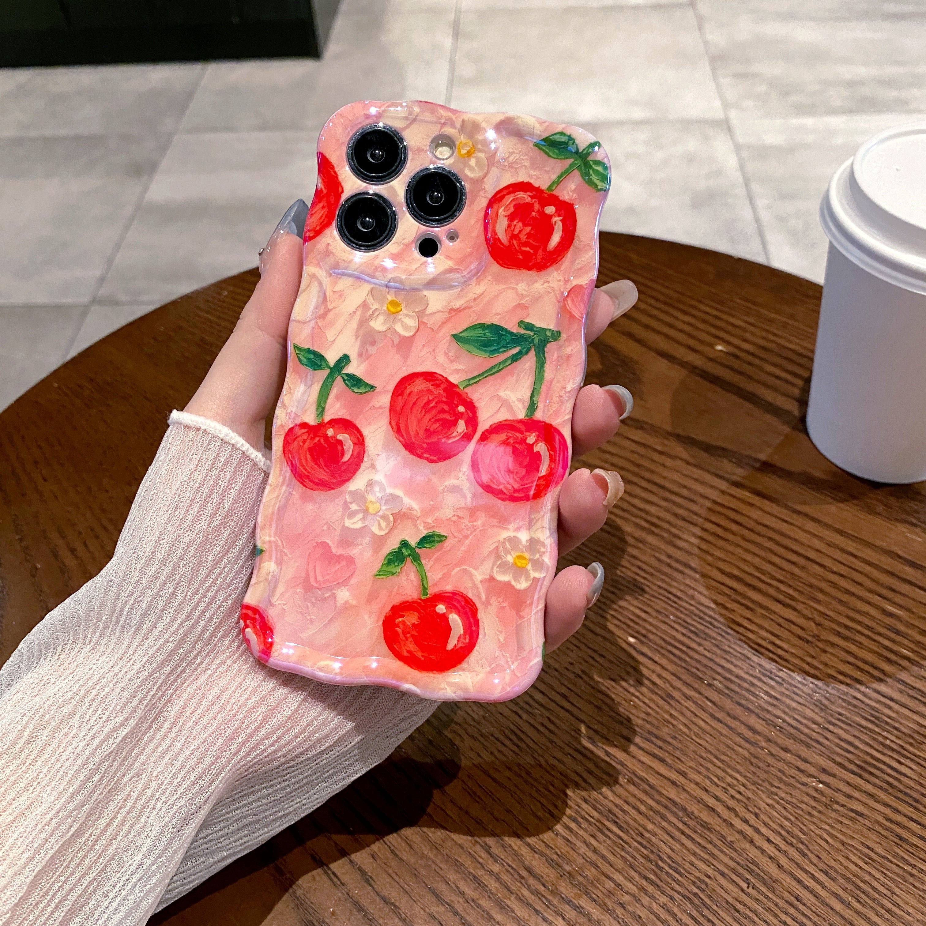 Sweet Cherries iPhone Case in hand