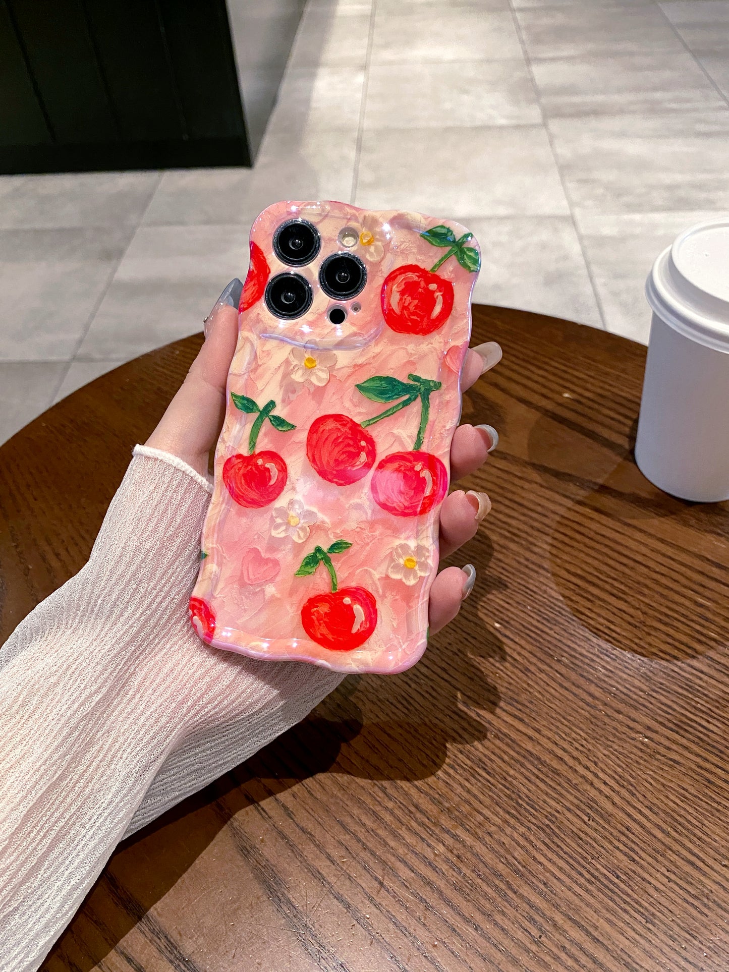 Sweet Cherries iPhone Case in hand