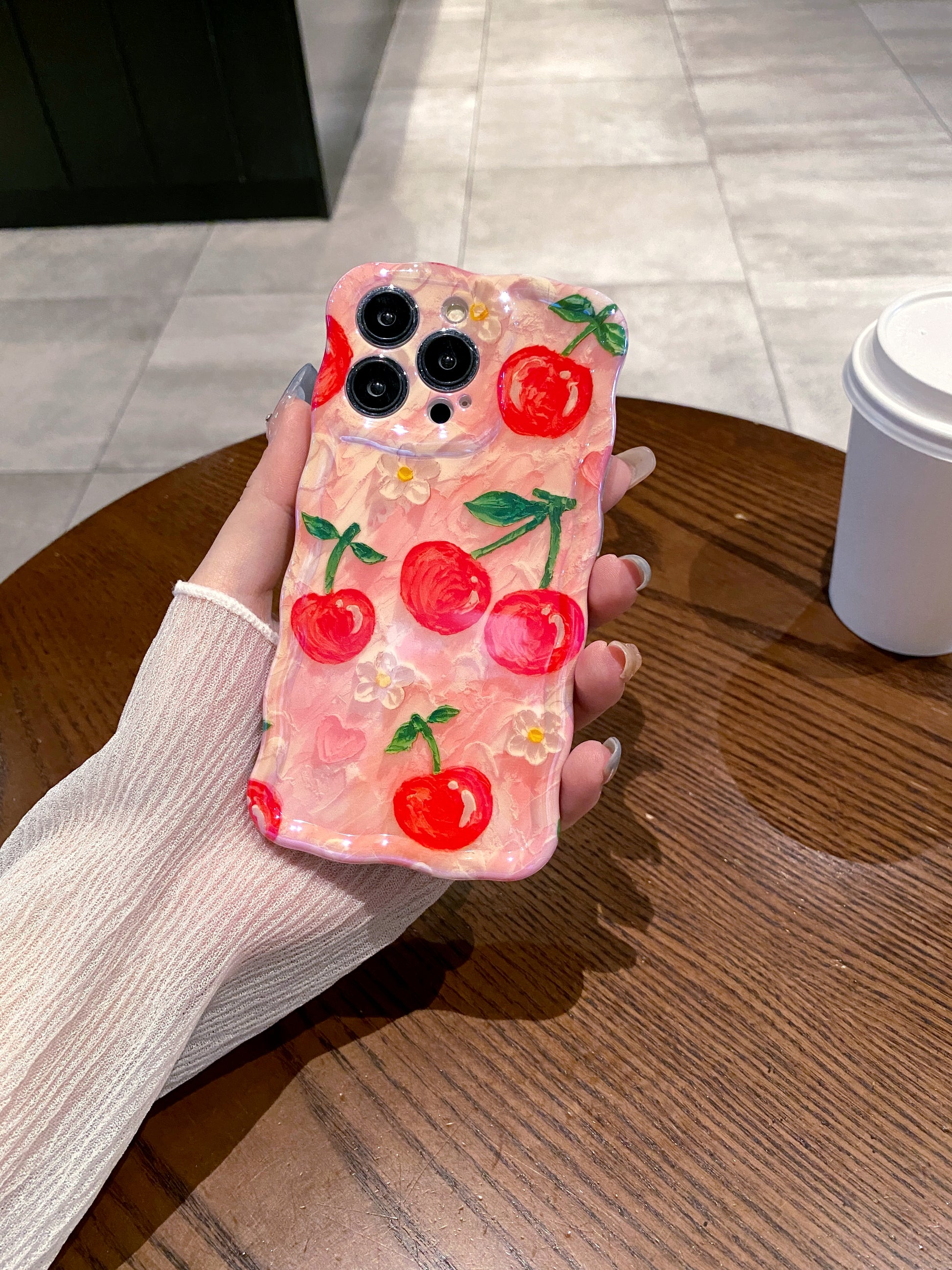 Sweet Cherries iPhone Case in hand