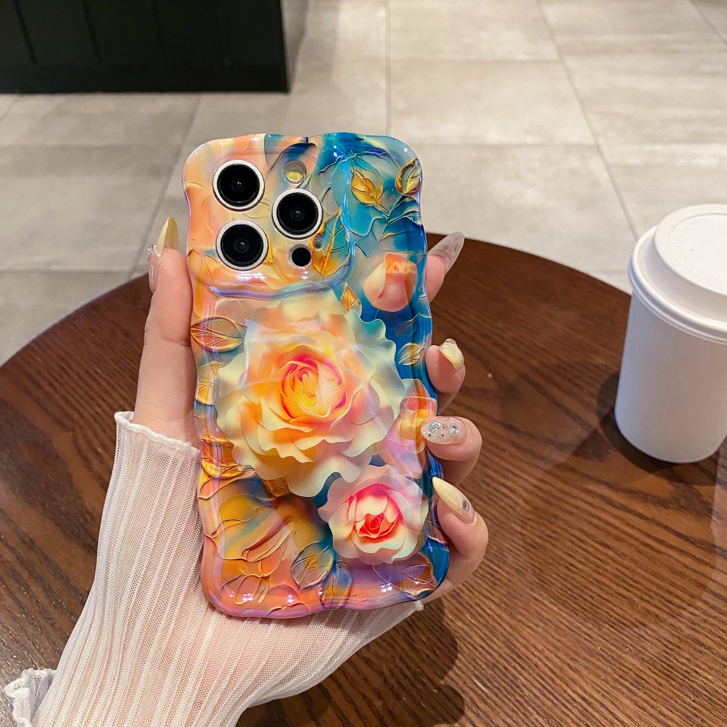 Glazed Golden Roses iPhone Case in hand