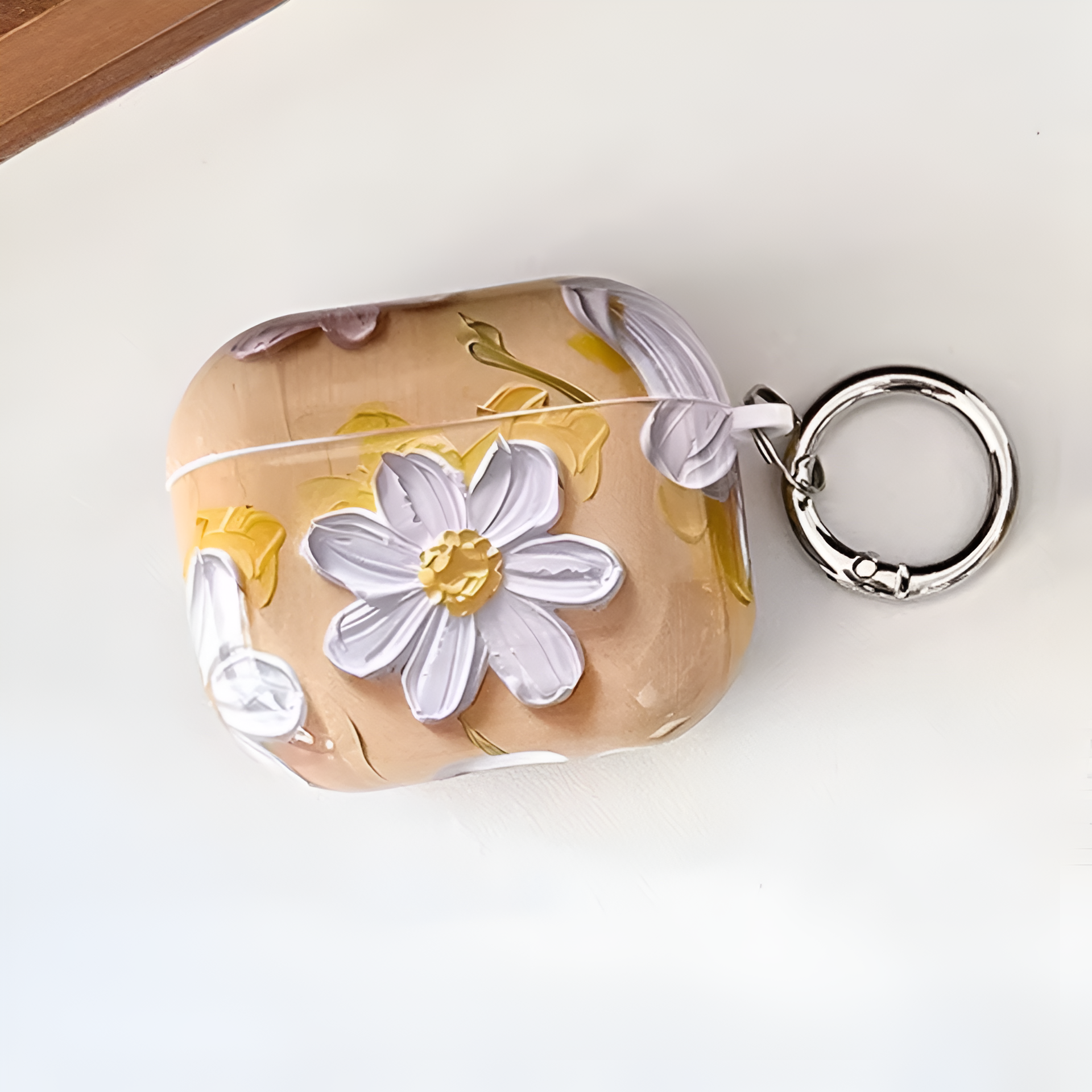 Daisy AirPod case with floral design and secure fit